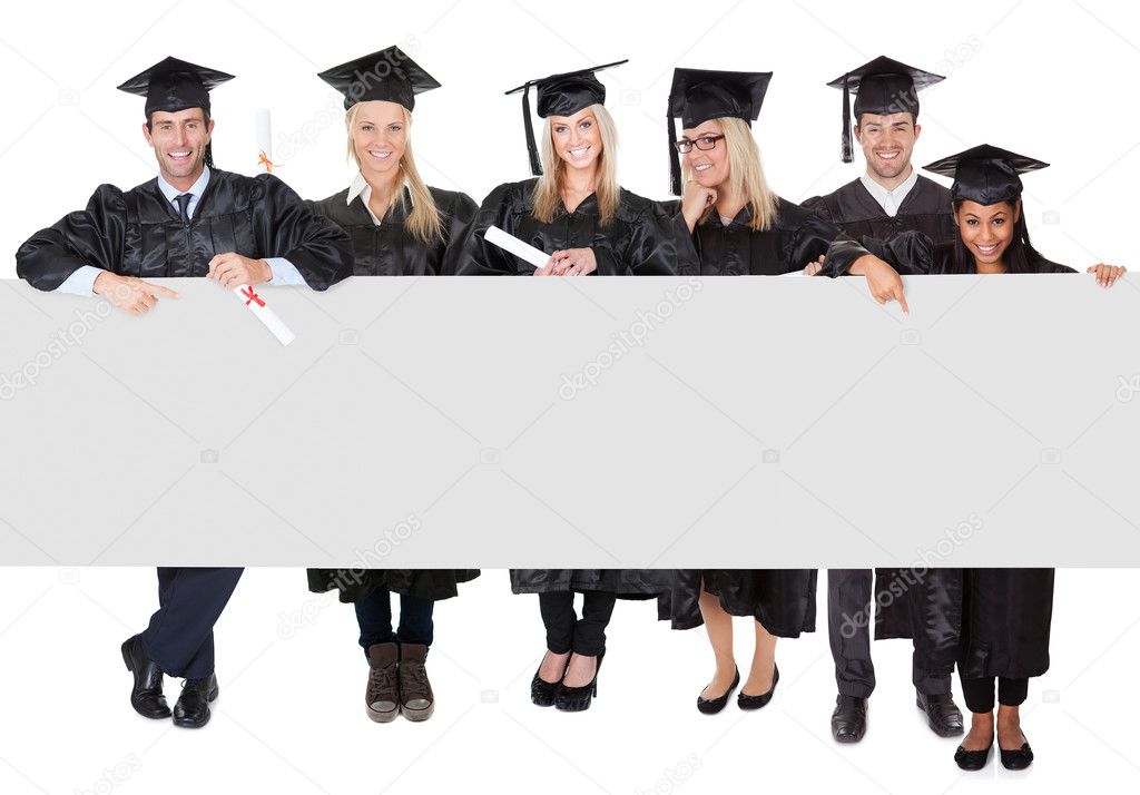 Group of graduate students presenting empty banner