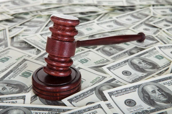 Judge gavel and dollars — Stock Photo, Image
