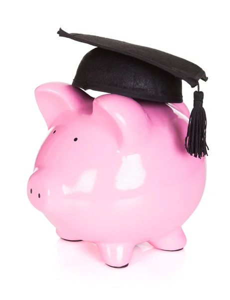 Piggybank wearing graduation hat — Stock Photo, Image