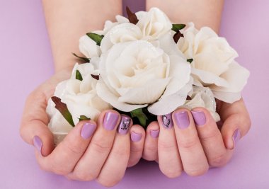 Close-up Of Hands Holding White Roses clipart