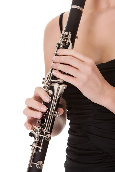 Hermosa joven tocando clarinete — Foto de Stock