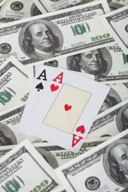 bir çift as ve Amerikan Doları