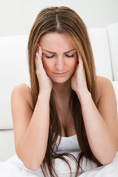 Portrait Of Young Woman Suffering With Headache — Stock Photo, Image