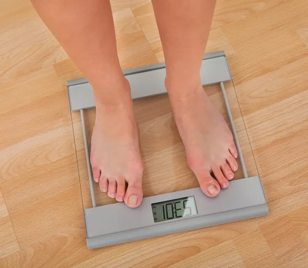 Low Section Of Woman Measuring Weight — Stock Photo, Image