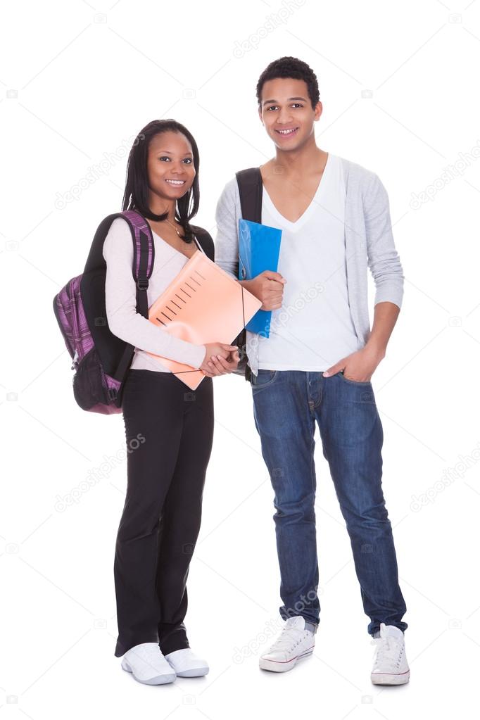 Two Students With Folder And Backpacks