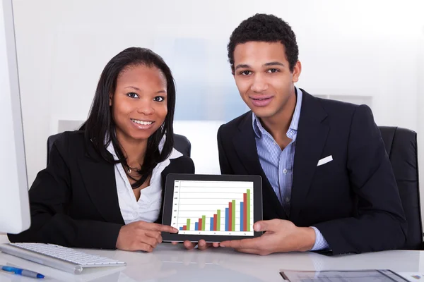 Two Businesspeople Showing Digital Tablet — Stock Photo, Image