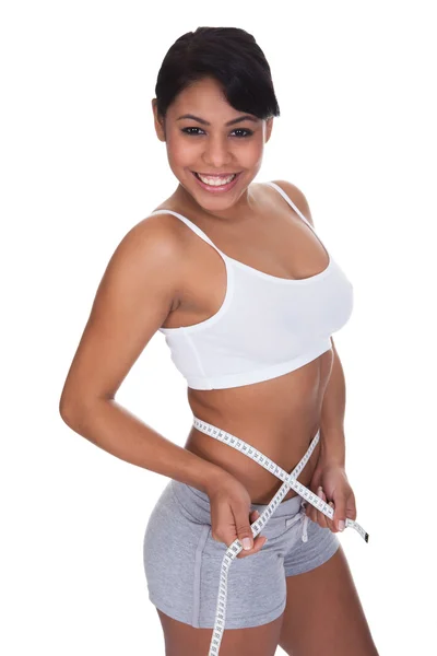 Portrait Of Young Woman Measuring Her Waistline — Stock Photo, Image