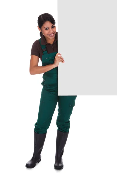 Young Female Gardner Holding Placard — Stock Photo, Image