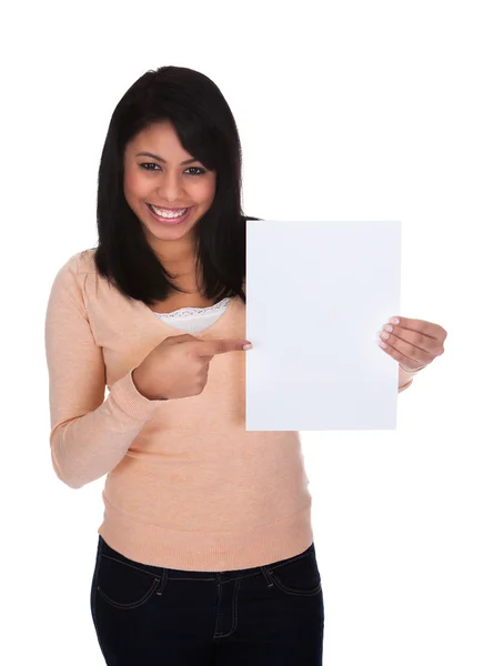 Mujer joven señalando a Placard —  Fotos de Stock