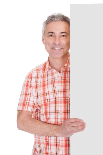 Glad mogen man håller Tom plakat — Stockfoto