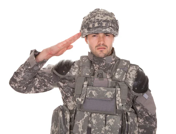 Retrato de homem em uniforme militar saudação — Fotografia de Stock