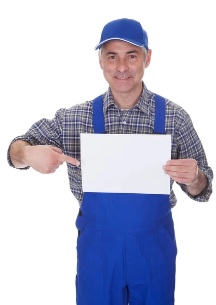 Mature Male Technician Holding Empty Sheet — Stock Photo, Image