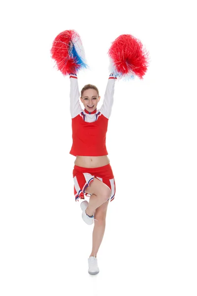 Ung cheerleader anläggning pom-poms — Stockfoto