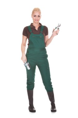 Portrait Of A Female Worker Holding Worktool clipart