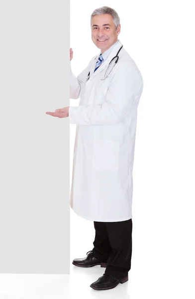 Portrait Of Male Doctor Holding Placard — Stock Photo, Image