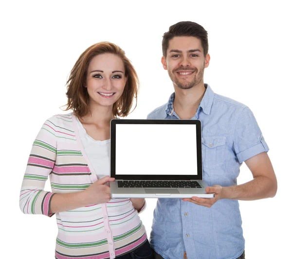 Young Couple Holding Laptop — Stock Photo, Image