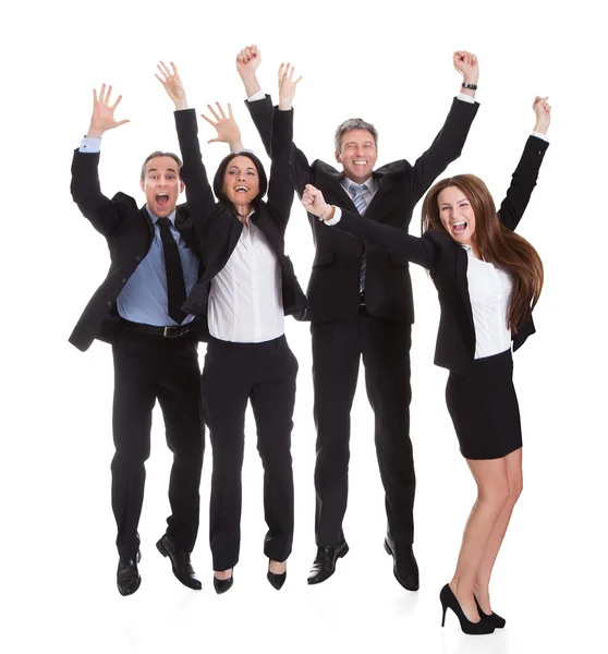 Empresários felizes saltando em alegria — Fotografia de Stock