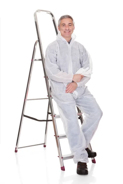 Mature Man Sitting On Ladder — Stock Photo, Image