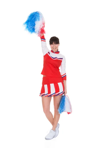 Cheerleader Holding Pom-pom Royalty Free Stock Images