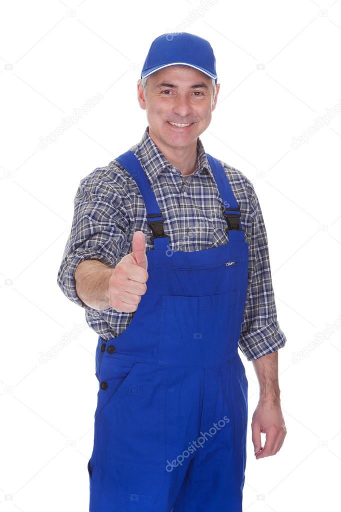 Mature Male Technician Making Thumbs Up Gesture
