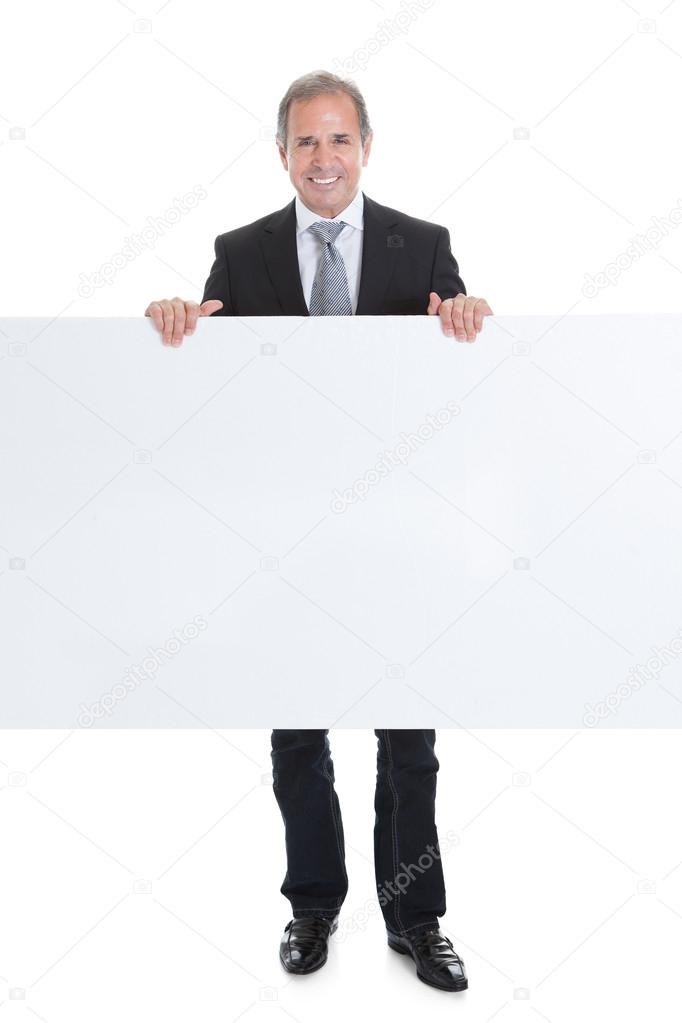 Happy Business Man Holding Blank Placard