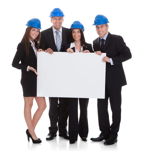 Gruppo di architetti Holding Placard — Foto Stock