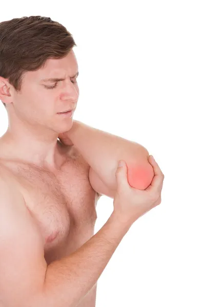 Hombre con dolor en codo — Stockfoto