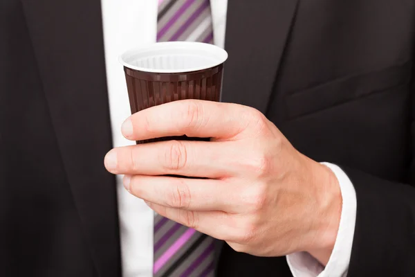 Geschäftsmann trinkt Kaffee — Stockfoto