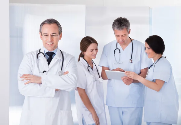 Male Doctor In Front Of Team Royalty Free Stock Photos