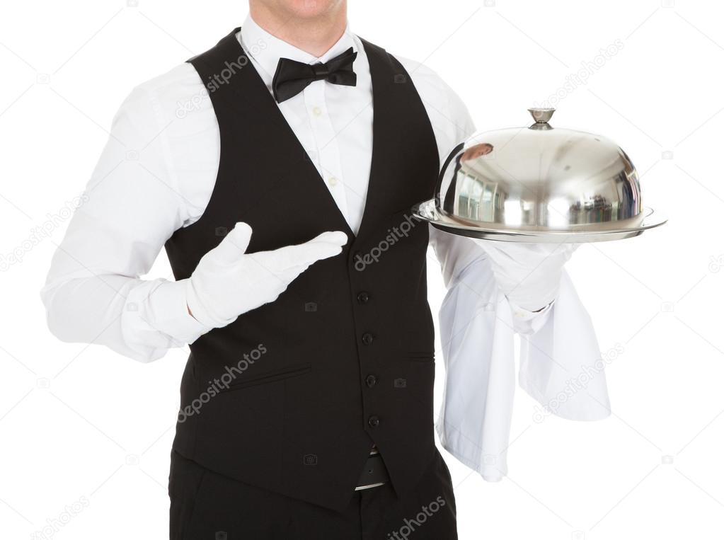 Waiter Holding Empty Silver Tray