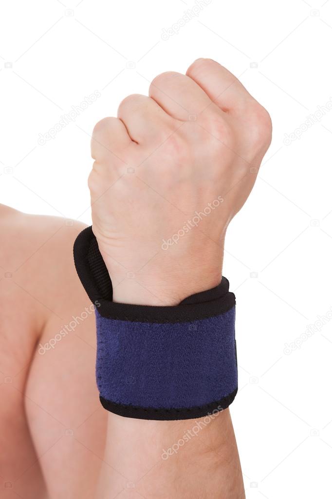 Close Up Of Man Wearing Wrist Brace — Stock Photo © AndreyPopov 28608429