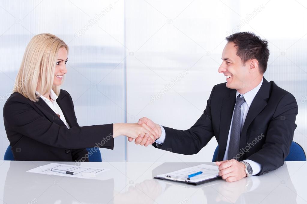 Two Businesspeople Shaking Hand