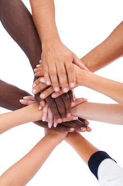 Group Of People Stacking Hands Together clipart