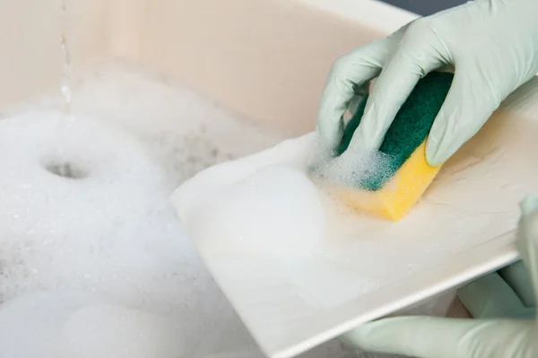 Žena mycí deska — Stock fotografie