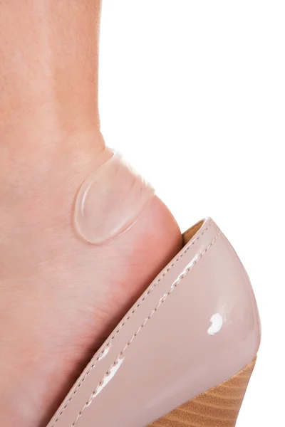 Sticky bandage on woman heel — Stock Photo, Image