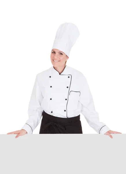 Chef femminile mostra Placard vuoto — Foto Stock