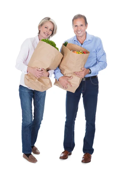 Mature Couple Holding Grocery — Stock Photo, Image