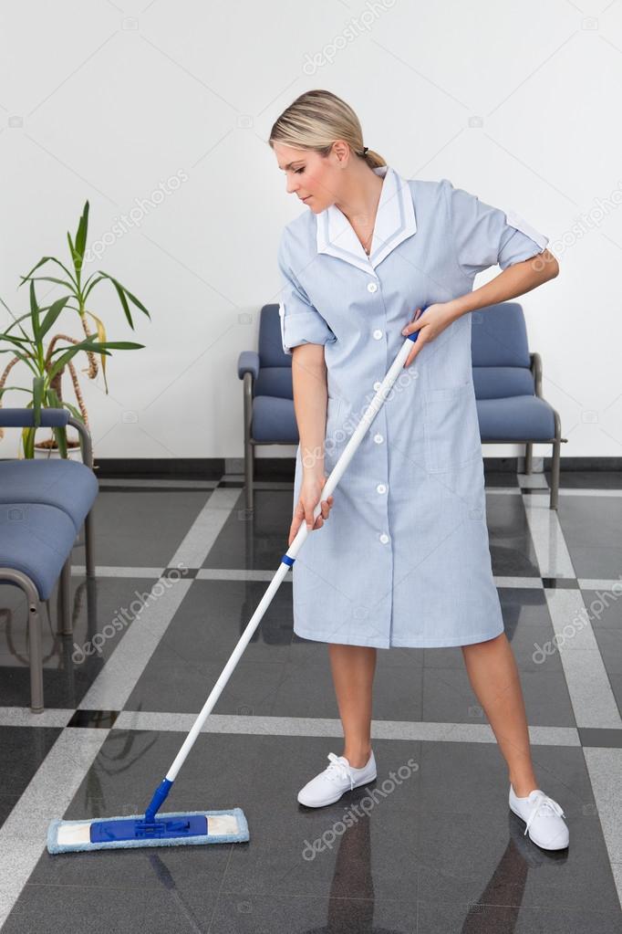 Maid Cleaning The Floor