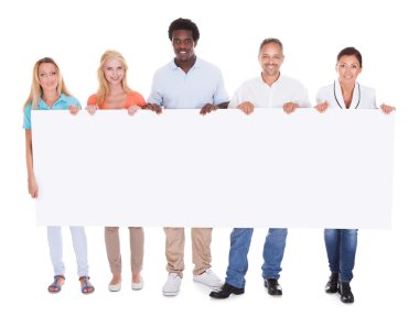 Casual Group Of People With Placard clipart