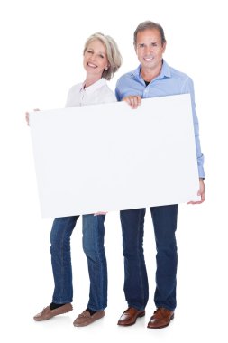 Olgun çift afişini holding portresi