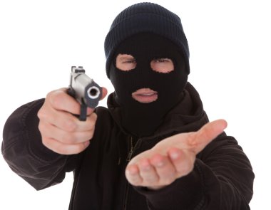 hırsız giyen maske holding silahı