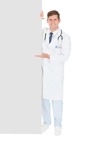 Male Doctor Holding Blank Placard — Stock Photo, Image