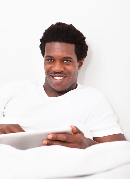 Young Man Holding Digital Tablet — Stock Photo, Image