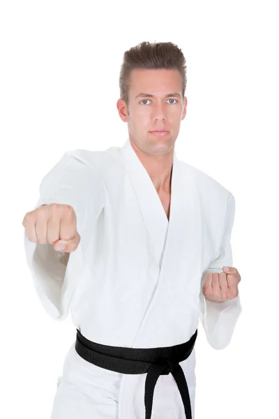 Junger Mann praktiziert Karate — Stockfoto