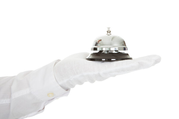 Waiter Holding A Service Bell In Hand