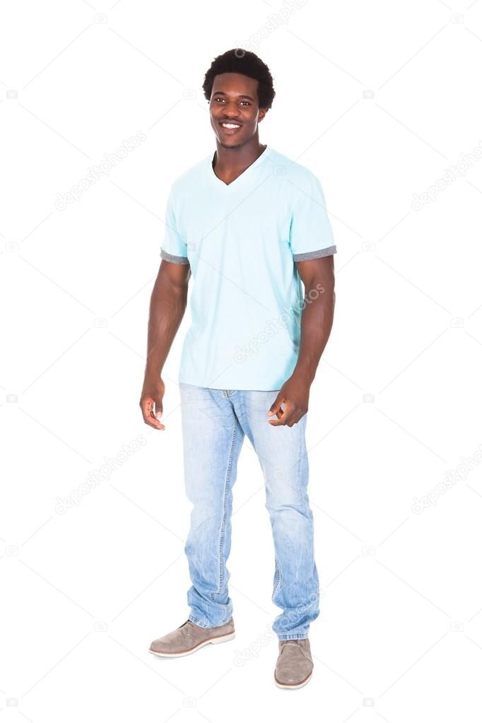 Casual Young African Man Posing In Front Of Camera