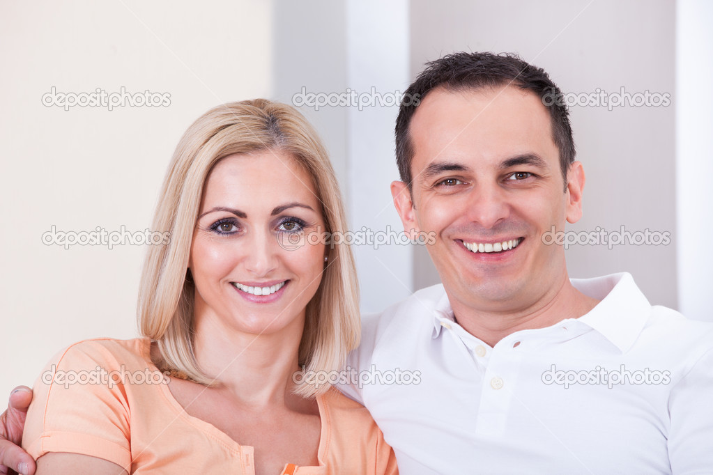 Mid-adult Happy Couple Smiling Together