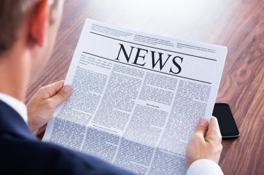 işadamı okuma gazete