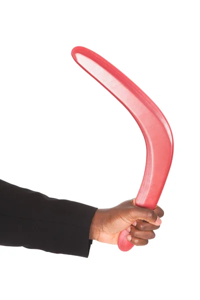 Erkeğin el Holding Boomerang — Stok fotoğraf