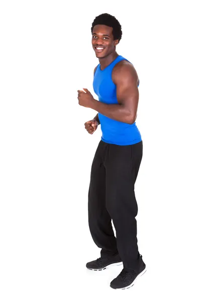 Afrikaanse jonge man joggen — Stockfoto